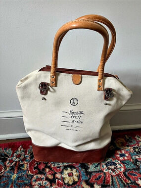 Original Flea Bag canvas tote with leather handles and bottom. Cream color with